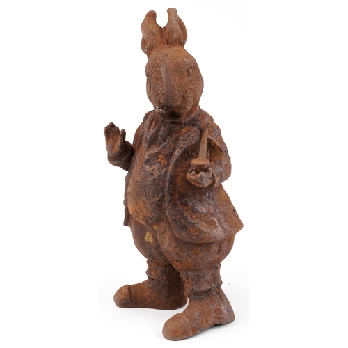 604 - Garden cast iron comical rabbit smoking a pipe, 43cm high