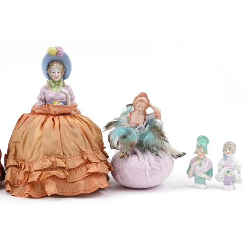 618 - 19th century and later half pin dolls including three pin cushions, the largest 21cm high