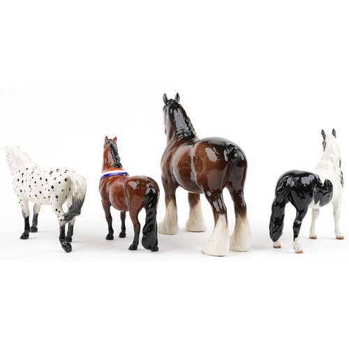 682 - Four Beswick collectable horses including Clydesdale, Appaloosa, pinto pony and Piebald pinto pony, ... 