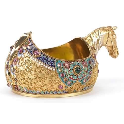 119 - Silver gilt champleve enamel kovsh having a horsehead design handle and set with colourful cabochons... 