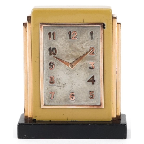 Van Cleef & Arpels, French Art Deco gold mounted and enamel travel clock with stepped shoulders having white metal dial engraved Van Cleef & Arpels with applied Arabic markers, various numbers to the base, ex Christies label verso, 8cm high