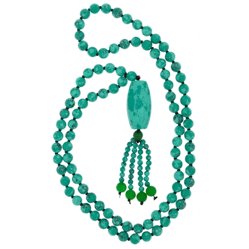 2765 - Turquoise matrix toggle necklace with green jade tassels, 84cm in length, 84.0g