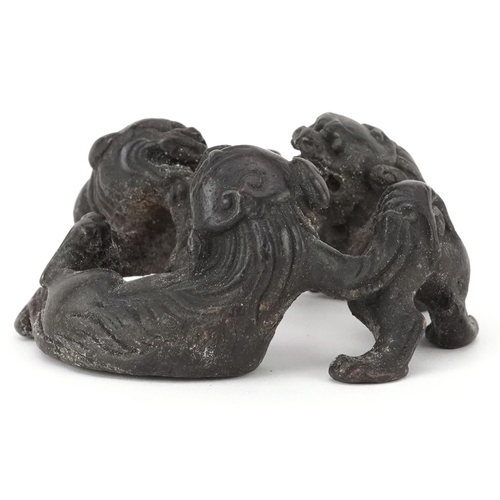 1494 - Chinese patinated bronze of three mythical animals, 6cm in diameter