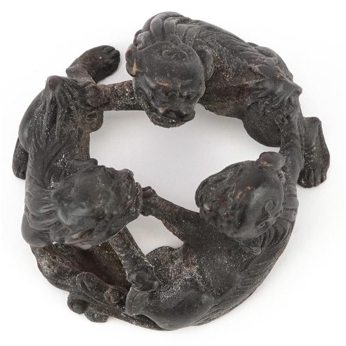 1494 - Chinese patinated bronze of three mythical animals, 6cm in diameter