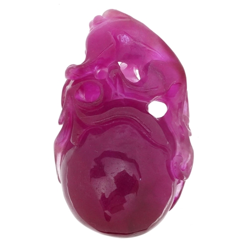 627 - Chinese pink tourmaline pendant carved with a water dragon and fruit, 6.5cm high