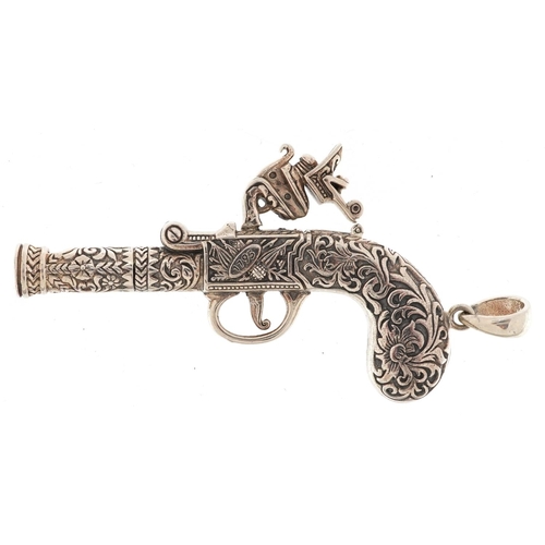 2777 - Sterling silver whistle pendant in the form of a flintlock pistol, 7cm in length, 22.6g