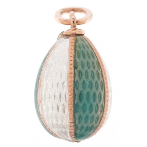 2529 - 14ct gold blue and white guilloche enamel egg pendant, impressed Russian marks to the suspension loo... 