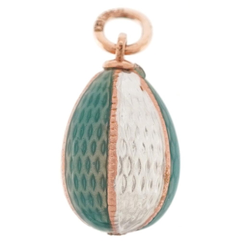 2529 - 14ct gold blue and white guilloche enamel egg pendant, impressed Russian marks to the suspension loo... 