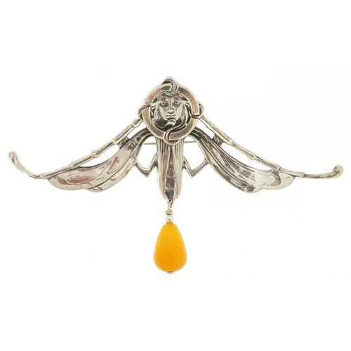 2774 - Egyptian Revival sterling silver brooch with amber coloured drop, 10.5cm wide, 20.2g