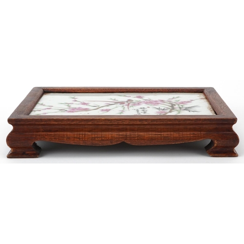 1445 - Chinese hardwood stand housing a porcelain panel decorated with birds amongst flowers, signed with c... 