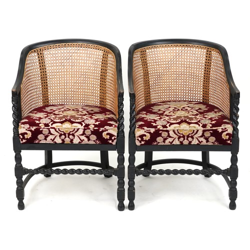 1134 - Pair of Victorian ebonised barley twist bergère tub chairs with floral upholstered cushioned seats, ... 