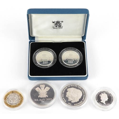 2178 - United Kingdom silver proof coins by The Royal Mint comprising 1989 two pounds two coin set, 1995 Wo... 