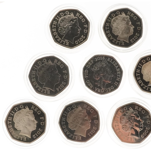 2193 - Twelve Elizabeth II Split Shield fifty pence pieces, some proof