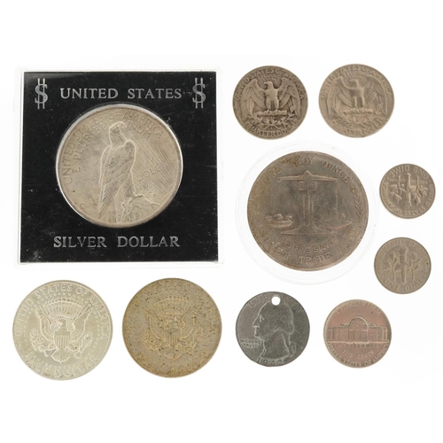 2107 - United States of America coinage including 1923 silver dollar, half dollars and quarter dollars