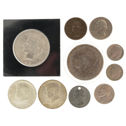 2107 - United States of America coinage including 1923 silver dollar, half dollars and quarter dollars