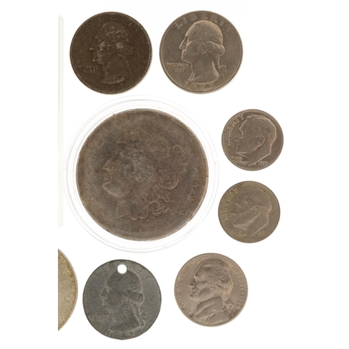 2107 - United States of America coinage including 1923 silver dollar, half dollars and quarter dollars