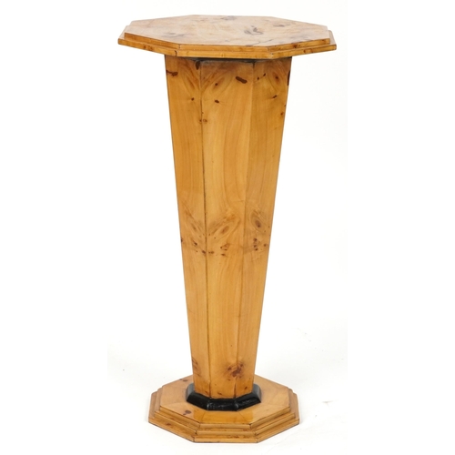 1081 - Art Deco style octagonal bird's eye maple effect pedestal with tapering column, 78.5cm high