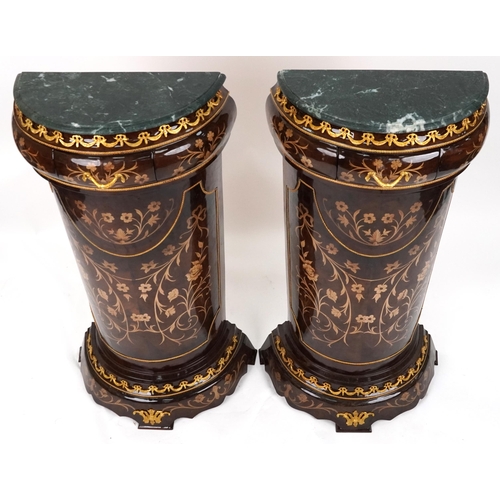 1039 - Pair of French Louis XV style walnut effect demi lune pedestals with gilt metal mounts, marble tops ... 