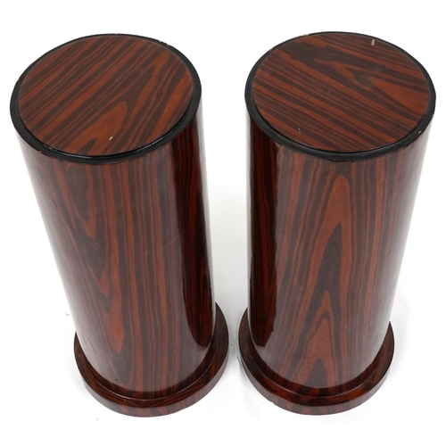 1180 - Pair of Art Deco style rosewood effect cylindrical columns, each 80cm high