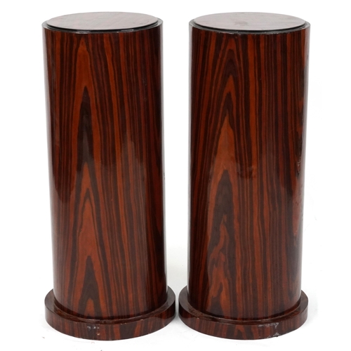 1180 - Pair of Art Deco style rosewood effect cylindrical columns, each 80cm high