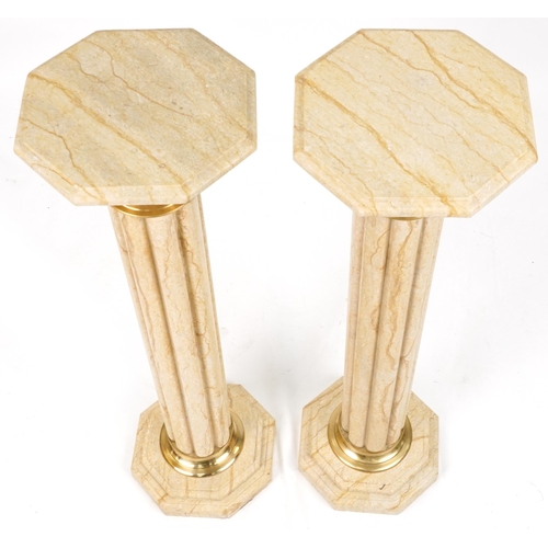 1067 - Pair of classical Travertine marble pedestal columns with gilt metal mounts, each 103cm high