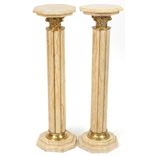 1067 - Pair of classical Travertine marble pedestal columns with gilt metal mounts, each 103cm high