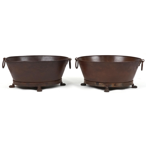 1188 - Pair of cast metal oval lock buckets with ring turned handles on paw feet, each 32cm H x 72cm W x 59... 