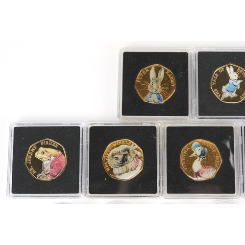 2188 - Thirty two Elizabeth II fifty pence pieces, various designs comprising Beatrix Potter, The Snowman a... 