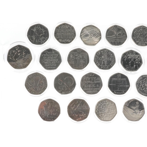 2191 - Twenty eight Elizabeth II fifty pence pieces, various designs including Scouts Be Prepared, London 2... 