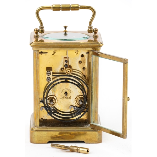 205 - Large French brass cased repeating carriage clock striking on a gong with enamelled dial having Roma... 