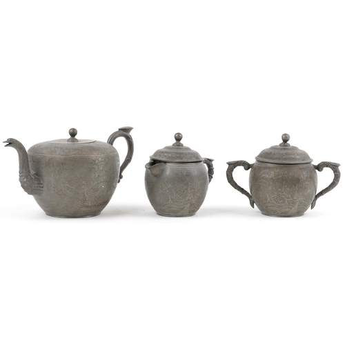 512 - Chinese Swatow Kut Hing pewter three piece tea set comprising teapot, lidded milk jug and lidded sug... 