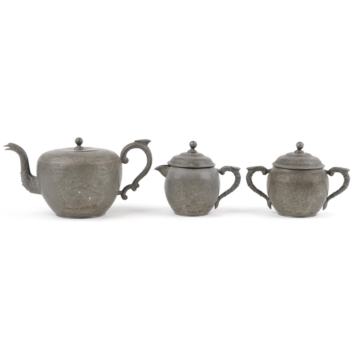 512 - Chinese Swatow Kut Hing pewter three piece tea set comprising teapot, lidded milk jug and lidded sug... 