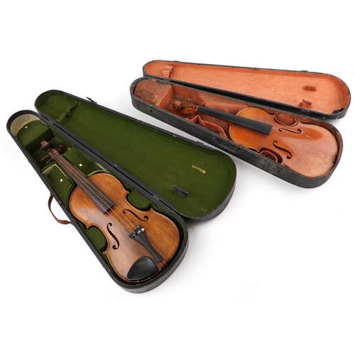 1686 - Two wooden violins with green baize lined wooden cases, the violin back 14 inches in length