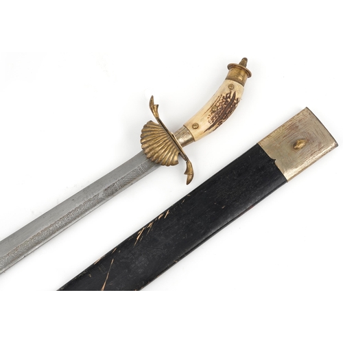 1903 - Military interest short sword and scabbard with staghorn handle and engraved steel blade, 82cm in le... 