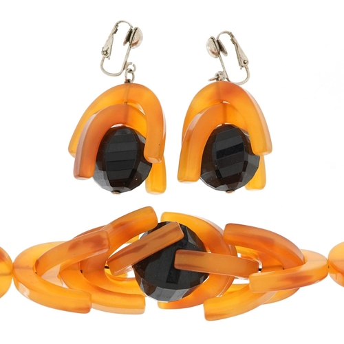 2773 - Art Deco Bakelite necklace and matching earrings, the necklace 46cm in length, total 155.0g