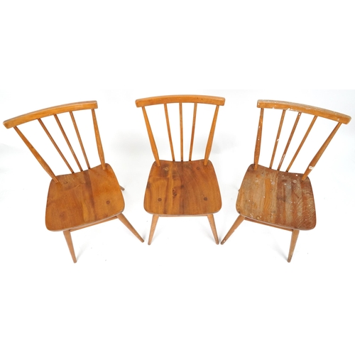 1040 - Ercol, three mid century light elm 391 chairs