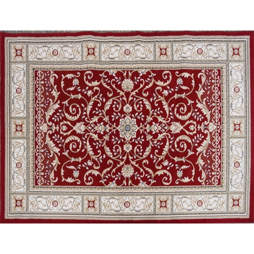 1225 - Rectangular red and cream ground floral rug, 230cm x 160cm