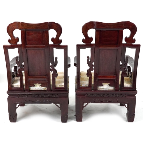 1125 - Pair of Chinese carved hardwood throne chairs with lift of cushioned seats, possibly Hongmu, each 10... 