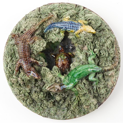 Maneul Mafra, 19th century Portuguese Palissy ware wall plate decorated in relief with sea creatures, impressed marks to the reverse, 19cm in diameter