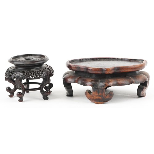 565 - Eight antique Chinese carved hardwood stands, some possibly Hongmu, the largest 16.5cm wide