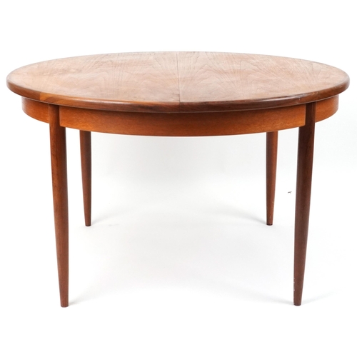 1009 - G Plan, mid century teak Fresco extending dining table, 73cm high x 121cm in diameter when closed