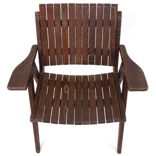 1063 - Autoban, stained teak slice chair, 81cm high