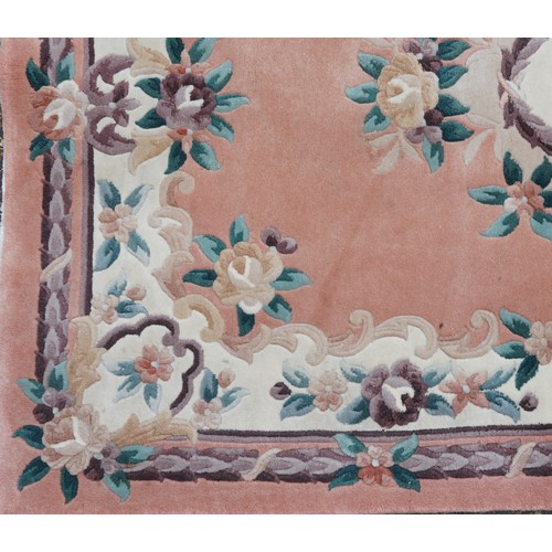 1222 - Two rectangular Chinese floral rugs, the largest 195cm x 122cm