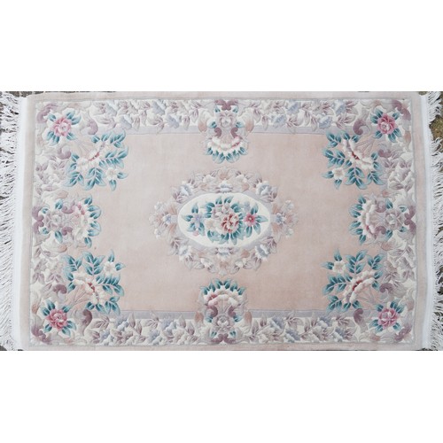 1222 - Two rectangular Chinese floral rugs, the largest 195cm x 122cm