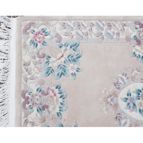 1222 - Two rectangular Chinese floral rugs, the largest 195cm x 122cm