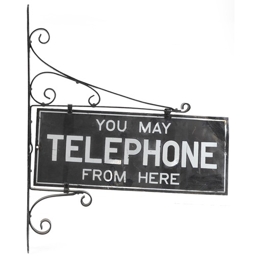 607 - You May Telephone from Here double sided enamel advertising sign with iron wall mount, 73cm high