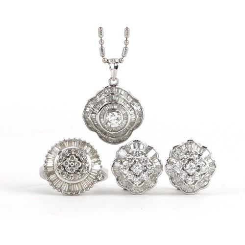18ct white gold diamond jewellery suite set with round brilliant cut diamonds and baguette cut diamonds comprising pendant on necklace, ring and earrings, the largest diamond approximately 0.25 carat, the largest round diamond in the earrings approximately 2.8mm in diameter, the ring size M/N, total weight 22.8g
PROVENANCE: Purchased by the vendor from Chow Tai Fook in Hong Kong