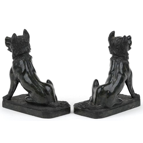 372 - Pair of carved green hardstone sculptures of seated dogs, each 16cm high