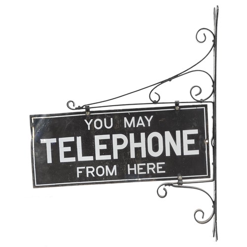 607 - You May Telephone from Here double sided enamel advertising sign with iron wall mount, 73cm high