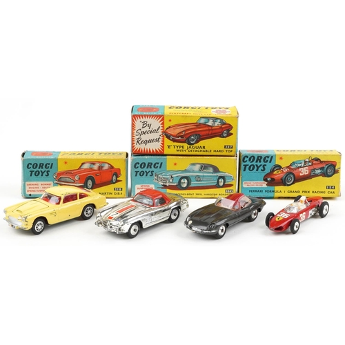 1602 - Four vintage Corgi Toys diecast vehicles with boxes comprising Aston Martin DB4 218, E Type Jaguar 3... 